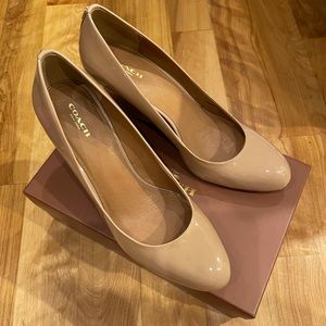 Nude patent wedges from Coach.